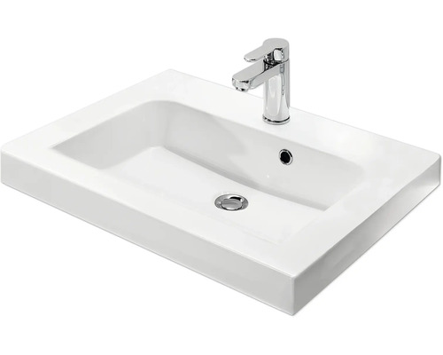 Weißes Keramik Waschbecken mit Armatur