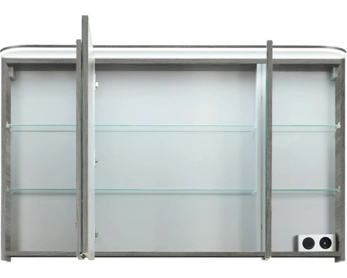 Armoire de toilette ouverte avec trois portes et étagères en verre