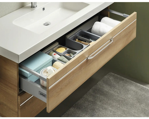 Meuble sous-lavabo avec tiroirs coulissants et accessoires de salle de bain
