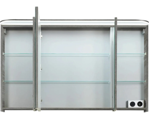 Armoire de toilette ouverte avec trois portes et étagères en verre
