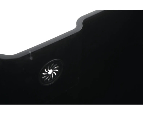 Gros plan d''un pot de fleurs noir avec trou de drainage