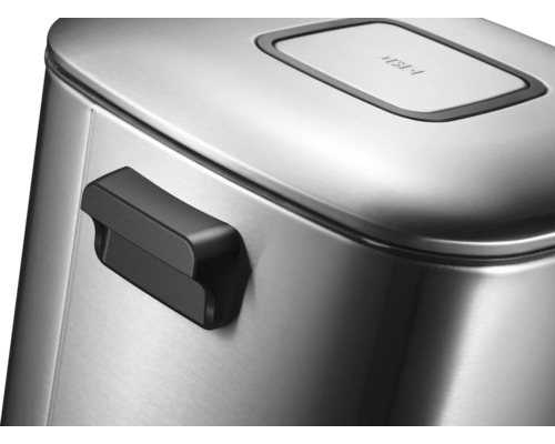 Vue détaillée d''une poubelle métallique avec poignée