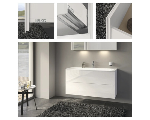 Salle de bain avec meuble sous-vasque, lavabo et miroir