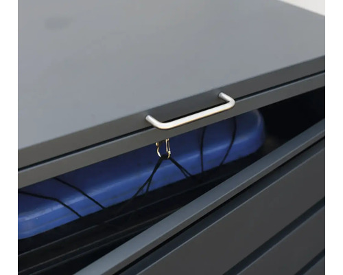 Boîte de rangement ouverte avec un objet bleu