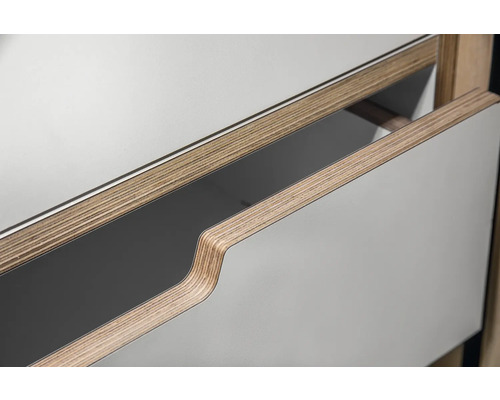 Detailaufnahme einer Schublade aus Holz und beschichteten Oberflächen