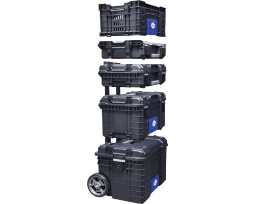 Pile de boîtes à outils et de coffres à outils noirs avec roulettes