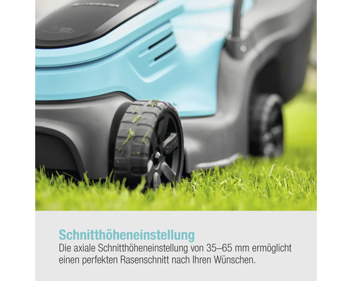 Detailaufnahme eines Rasenmähers auf Rasen