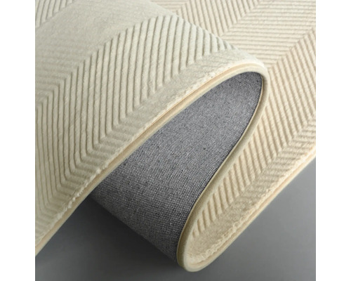 Vue détaillée d''un tapis avec un motif en zigzag