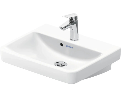 Lavabo en céramique blanche avec robinet