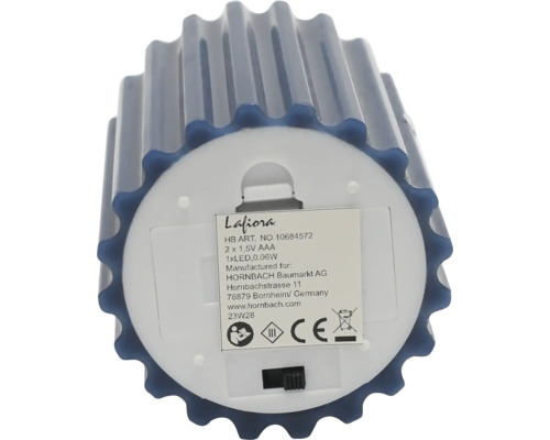 Dessous d''une bougie LED Lafiora avec compartiment à piles et informations sur le fabricant