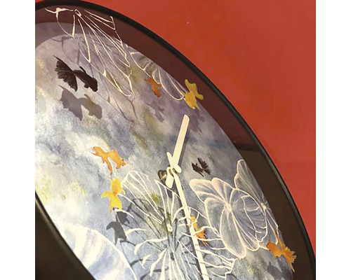Horloge murale décorative avec motifs de poissons et affichage de l''heure