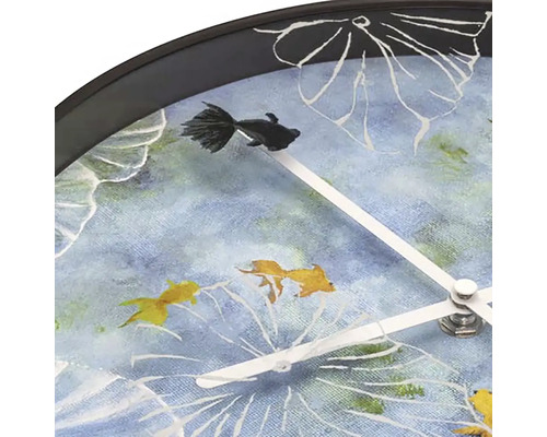 Horloge murale avec motifs de poissons et aiguilles