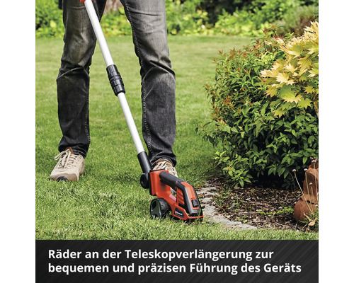 Rasentrimmer mit Teleskopverlängerung im Einsatz zur Rasenpflege