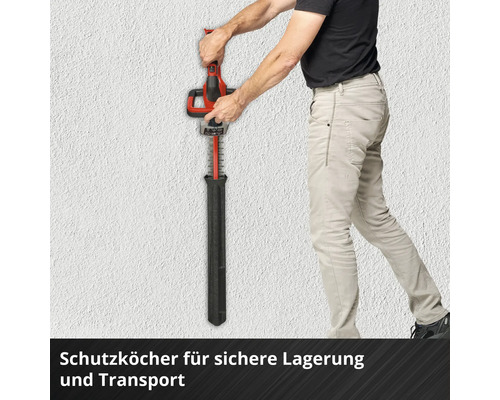 Mann benutzt eine Heckenschere mit Schutzhülle zur sicheren Aufbewahrung und zum Transport.