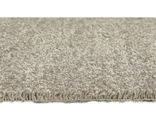 Gros plan d''un tapis de couleur claire avec une structure bouclée