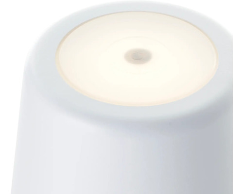 Weisse Tischleuchte mit eingeschaltetem Licht