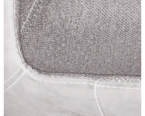 Detailaufnahme eines grauen Stoffbezugs mit weißer Ziernaht