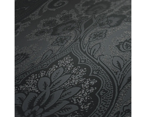 Gros plan d''un papier peint foncé avec motif floral