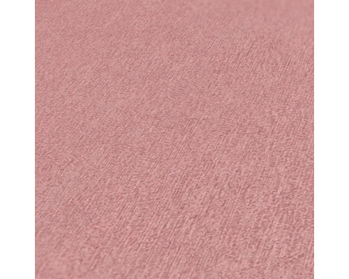 Gros plan d''un papier peint vinyle rose avec une texture fine