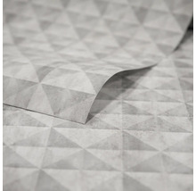 Gros plan d''un papier peint gris avec un motif triangulaire