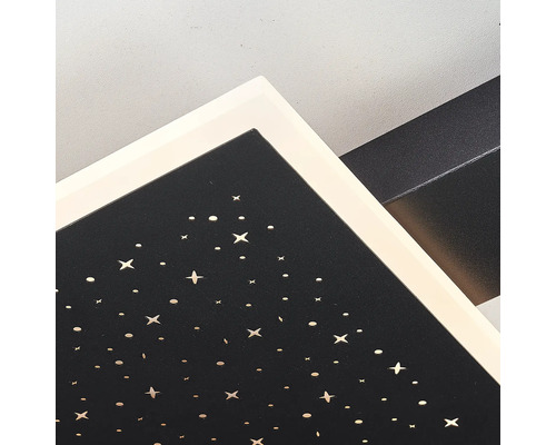 Detailansicht einer Deckenleuchte mit Sternenmuster