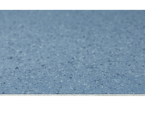 Gros plan d''un sol en vinyle bleu avec une texture mouchetée