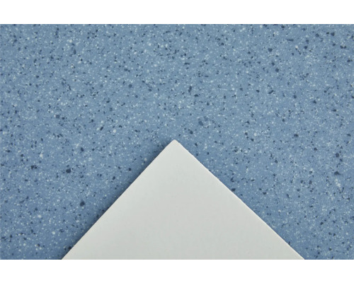 Gros plan d''un carreau de sol bleu avec un motif moucheté