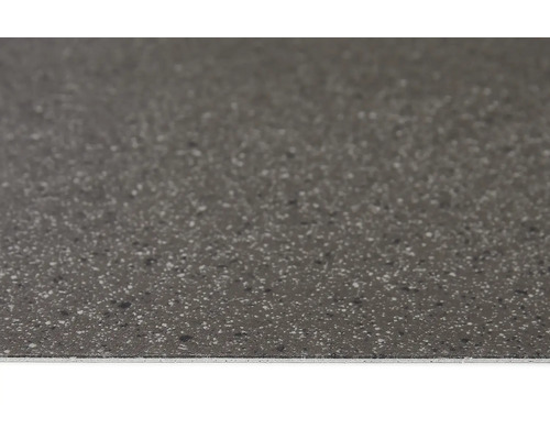 Gros plan d''un carreau de sol gris avec une texture mouchetée