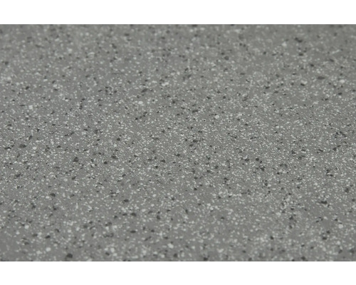 Gros plan d''un plan de travail avec une surface mouchetée