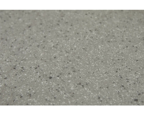 Gros plan d''un plan de travail avec une surface mouchetée.