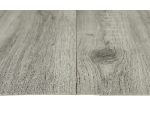Gros plan d''un sol en vinyle gris avec aspect bois.