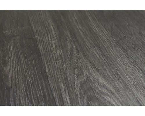 Nahaufnahme eines dunklen Vinylbodens mit Holzoptik