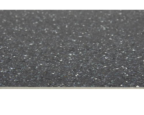 Nahaufnahme einer Bodenfliese mit gesprenkelter Oberfläche