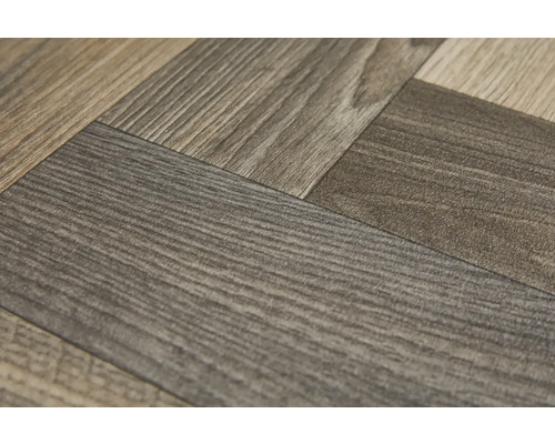 Gros plan sur un sol en vinyle à motif chevrons