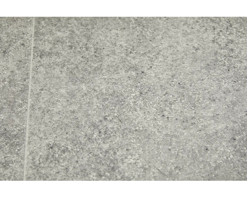 Nahaufnahme einer grauen Steinzeugfliese mit gesprenkelter Textur