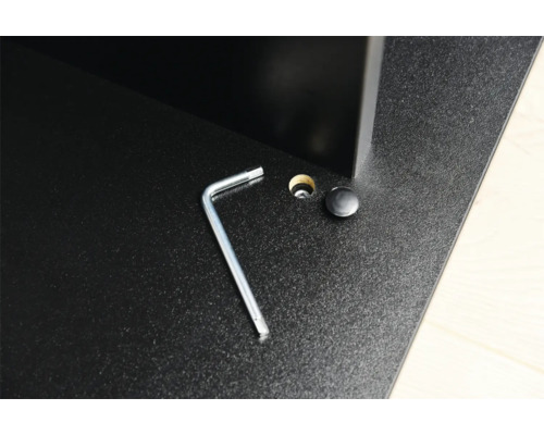 Vue détaillée d''un meuble avec clé Allen, trou de vis et capuchon