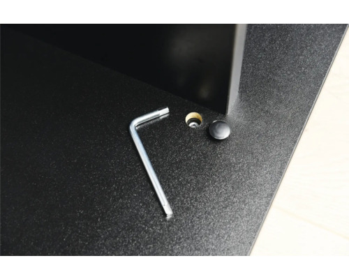 Gros plan d''un meuble avec clé Allen, trou et capuchon