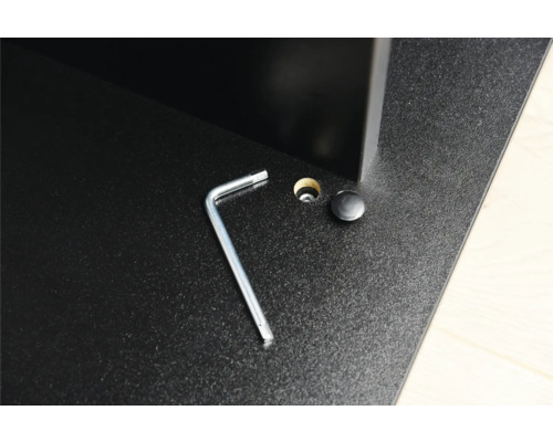 Clé Allen, trou et couvercle sur une surface