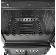 Vue intérieure d''un poêle à bois avec grille