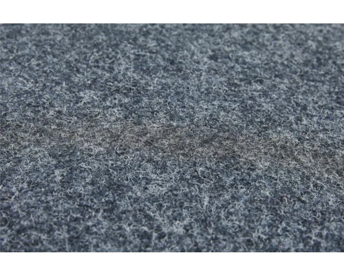 Gros plan d''une dalle de moquette bleue