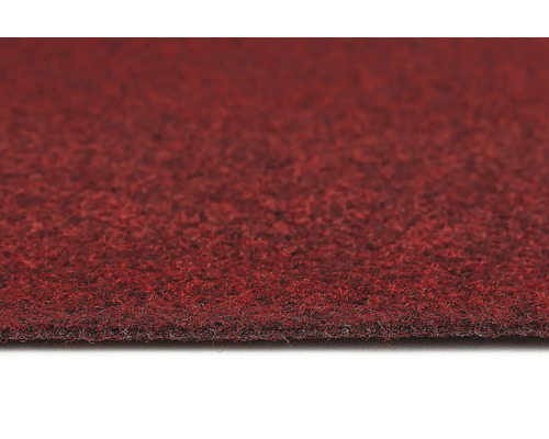 Gros plan d''un revêtement de sol en moquette rouge