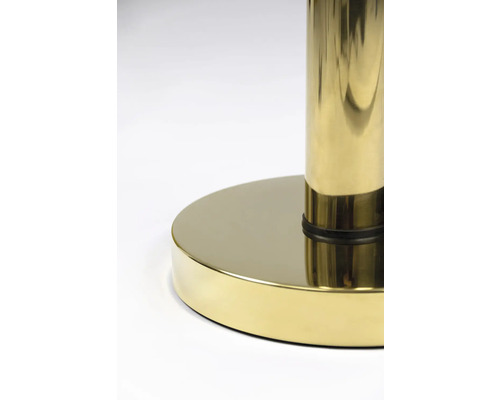 Detailaufnahme des runden, goldenen Sockels einer Stehlampe