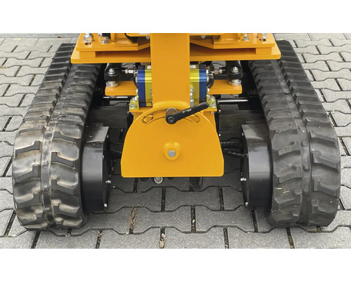 Detailansicht eines gelben Kettenfahrzeugs