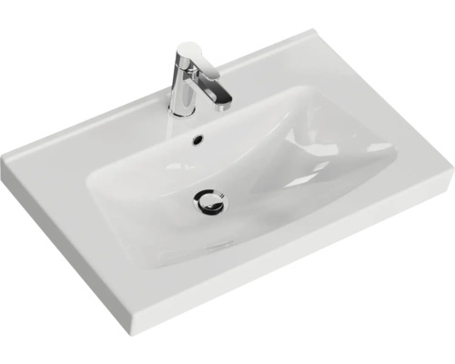 Weißes Waschbecken mit Armatur