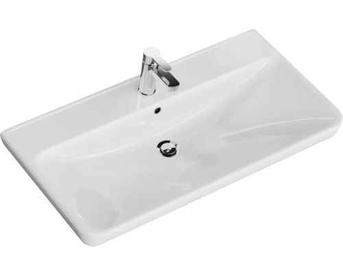 Vasque en céramique avec robinet pour la salle de bain