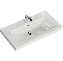 Lavabo en céramique blanche avec robinet