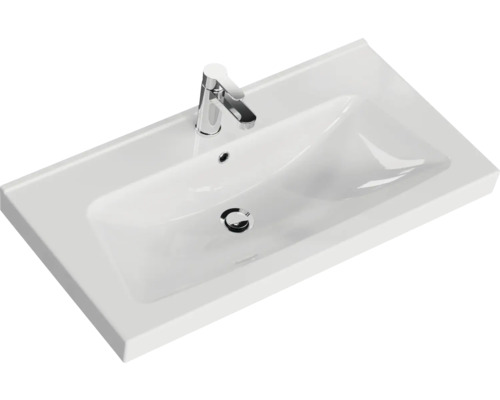 Waschtisch aus Sanitärkeramik mit Armatur