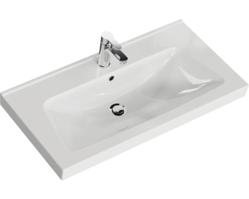 Waschtisch aus Sanitärkeramik mit Armatur