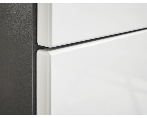 Gros plan d''un meuble de salle de bains avec tiroirs