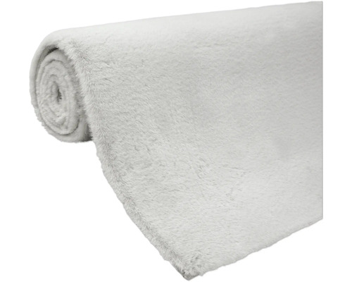 Tapis en fausse fourrure enroulé